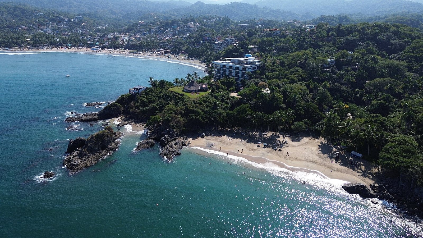 Aerial view of Playa de los Muertos, a small sandy cove between rocks and jungle just south of Sayulita
